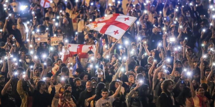 Protests in Georgia spread as PM defies US condemnation – CNN