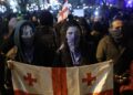 Georgia sees 3rd night of protests against ruling party’s suspension of EU talks – PBS
