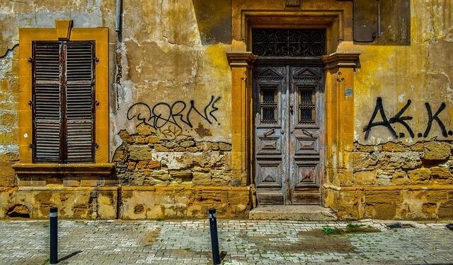 A wall through Nicosia reflects the decades-old ethnic divide in Cyprus, in photos – AP News