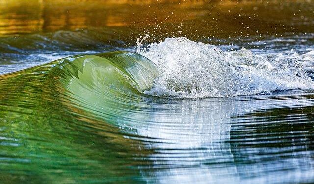 Watch: Massive River Wave Sweeps Surfer Out to Sea in Portugal – SURFER Magazine
